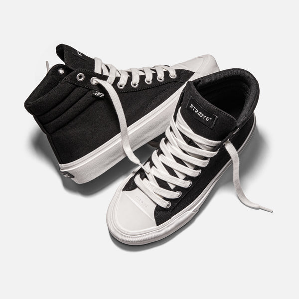 Black high top skate shoes on sale