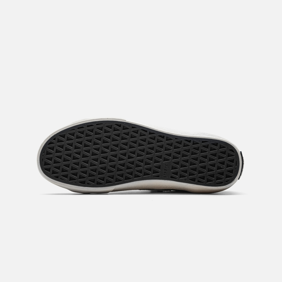 STRAYE Gower Graphite Bones – outsole bottom view showing grip pattern