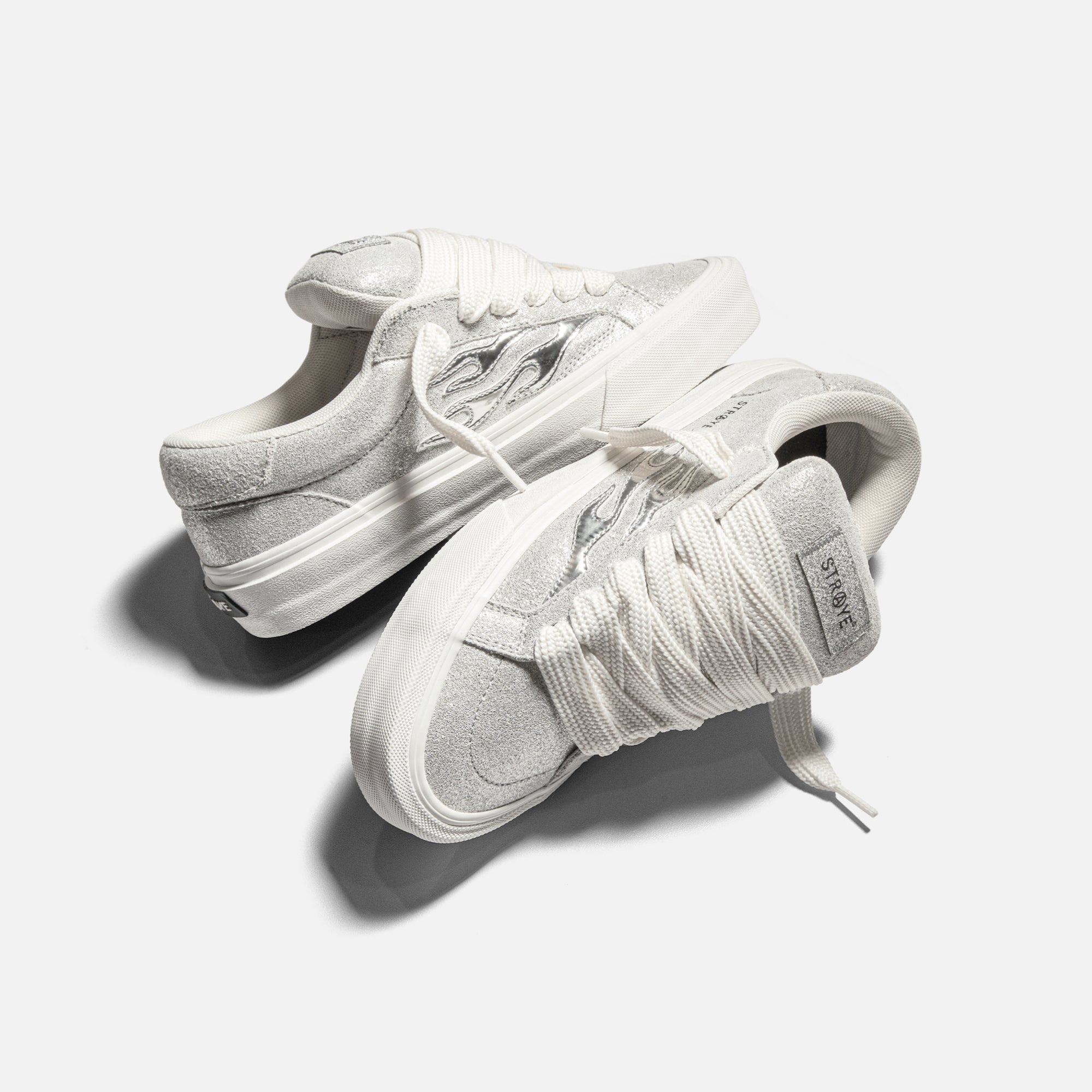 LOGAN PUFF - METALLIC CHROME | SIDE VIEW